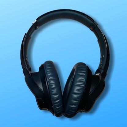 photo of black headphones on a blue background